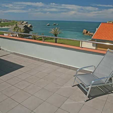 Apartamentos Playa De Portio Liencres Exteriör bild