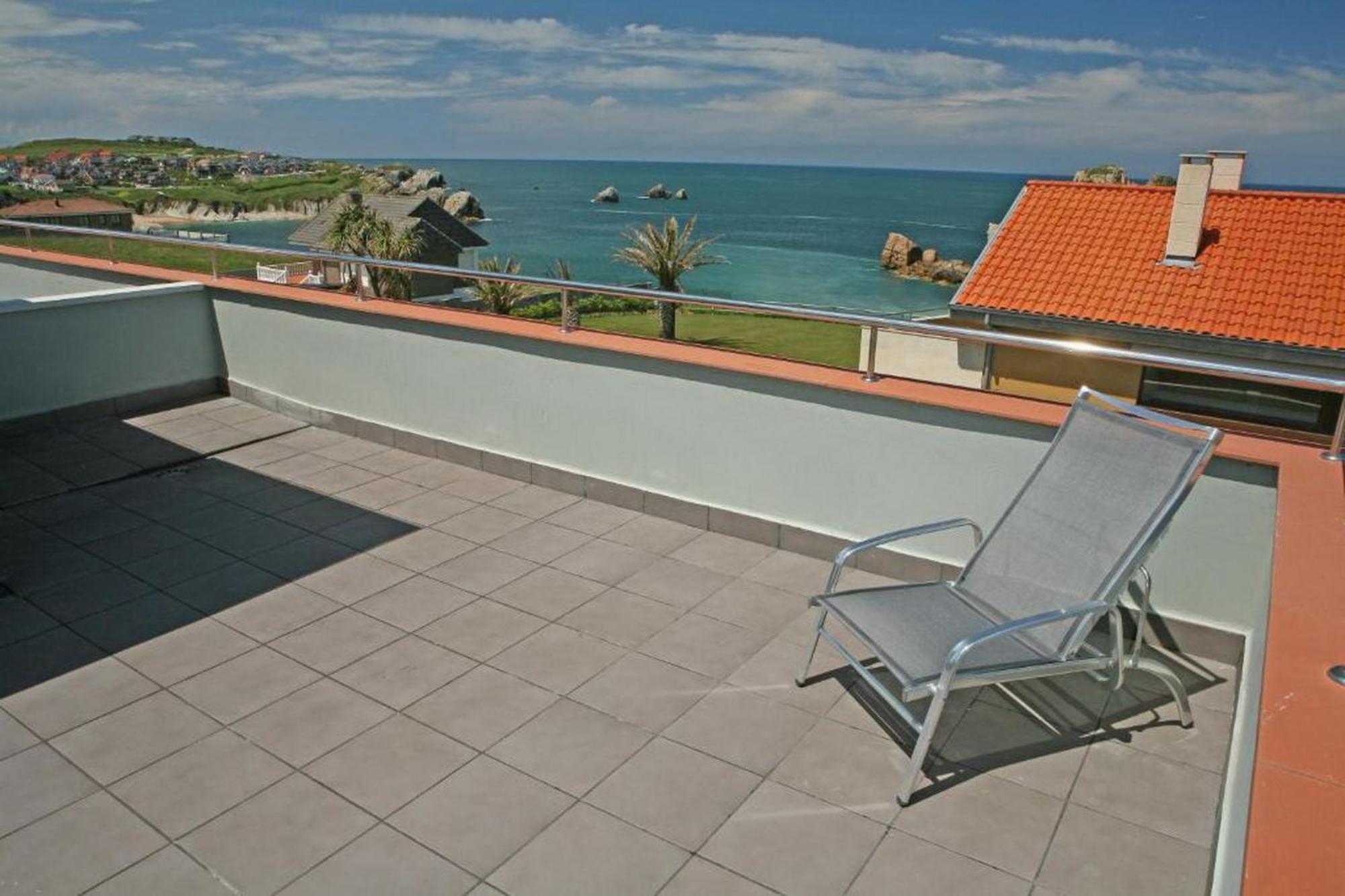 Apartamentos Playa De Portio Liencres Exteriör bild