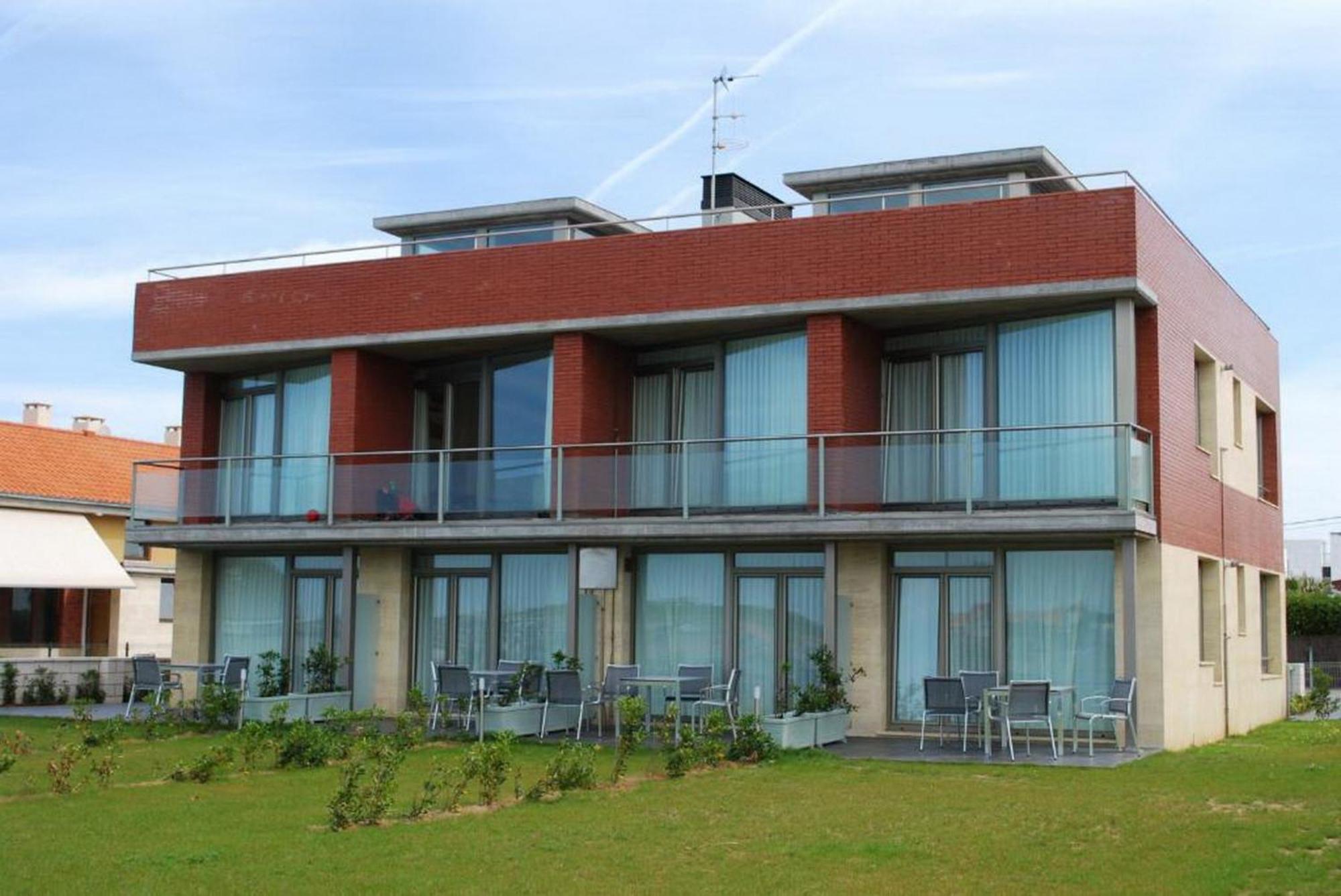 Apartamentos Playa De Portio Liencres Exteriör bild